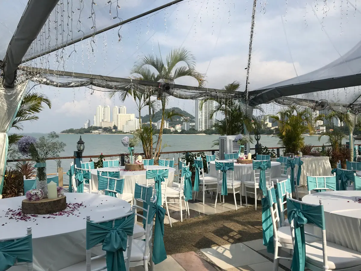 Tiffany chairs and round tables set up for an event by TentHouz