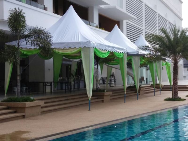 Arabian canopy with green scallop and dressed poles