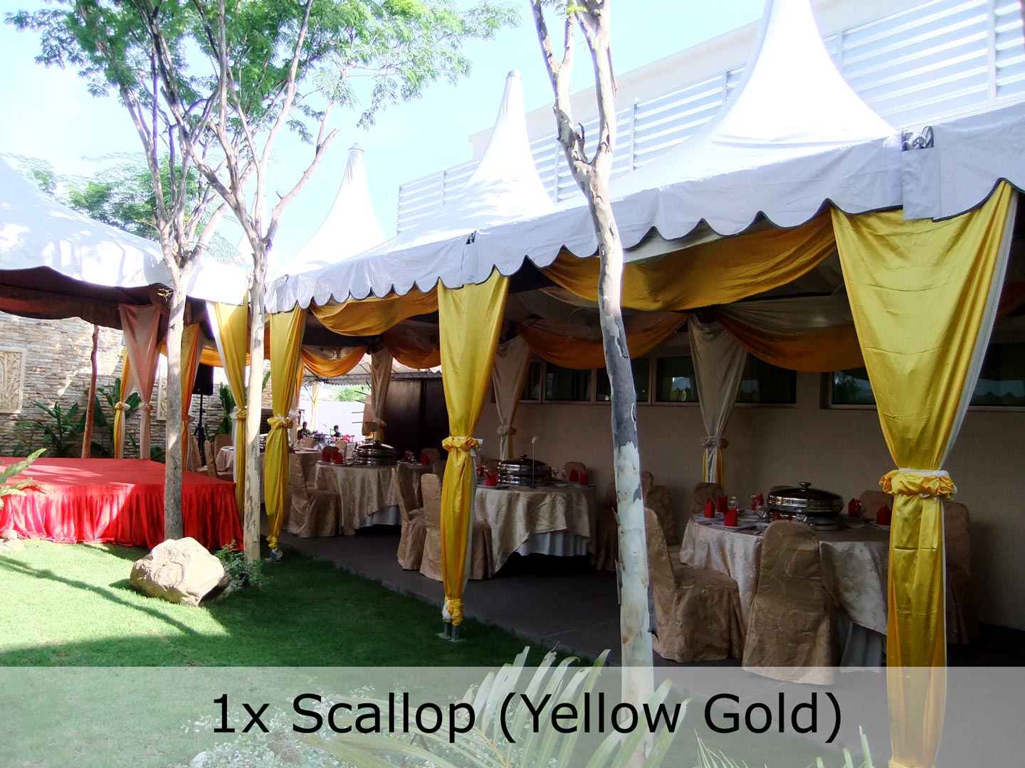 Single colour gold and yellow scallop fitted along a canopy eave