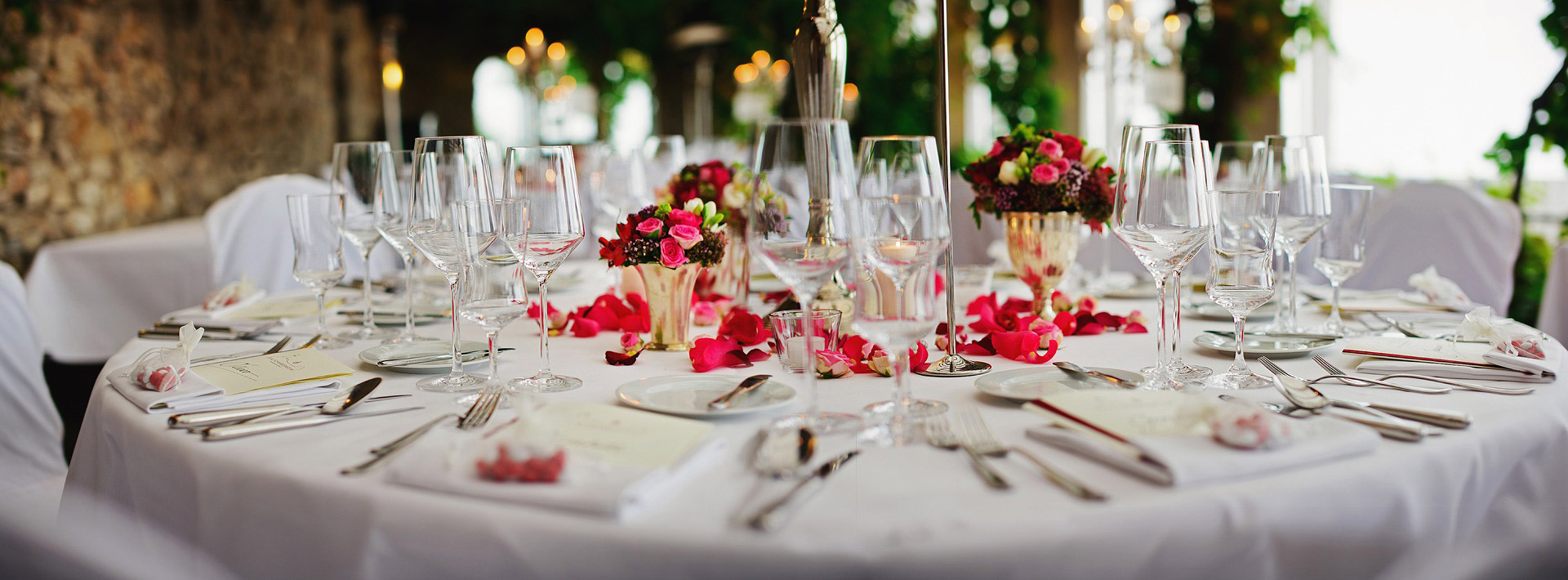 Banquet tables dressed in cloth for a dinner service