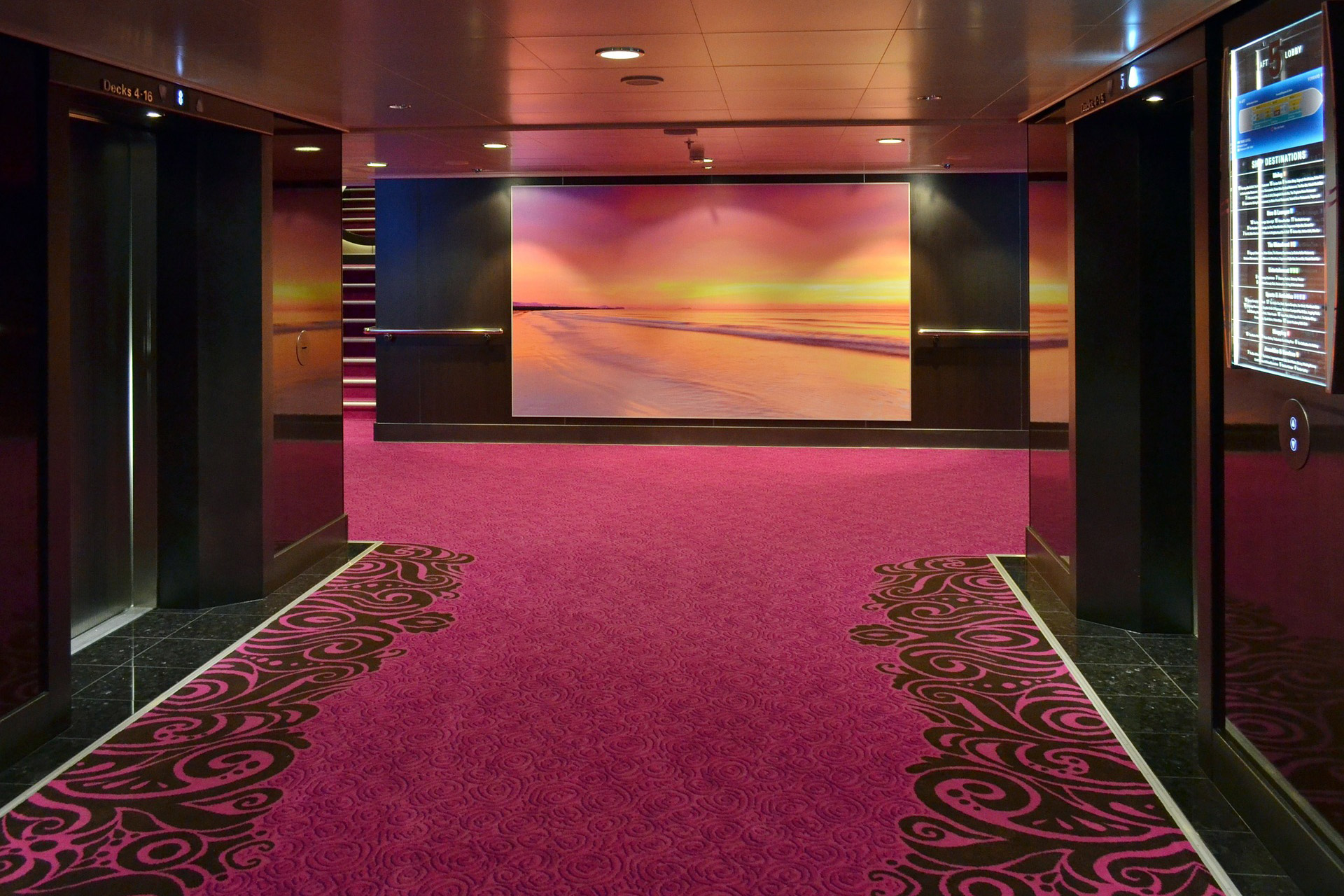 Carpeted event stage inside a marquee